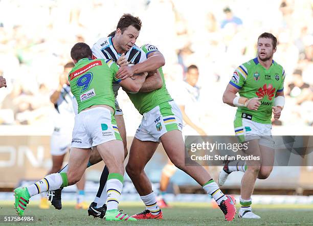 David Shillington of the Titans is tackled during the round four NRL match between the Canberra Raiders and the Gold Coast Titans at GIO Stadium on...