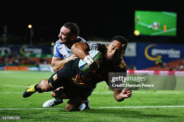 Toni Pulu of the Chiefs dives over to score a try during the round five Super Rugby match between the Chiefs and the Western Force at FMG Stadium on...