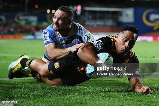Toni Pulu of the Chiefs dives over to score a try during the round five Super Rugby match between the Chiefs and the Western Force at FMG Stadium on...