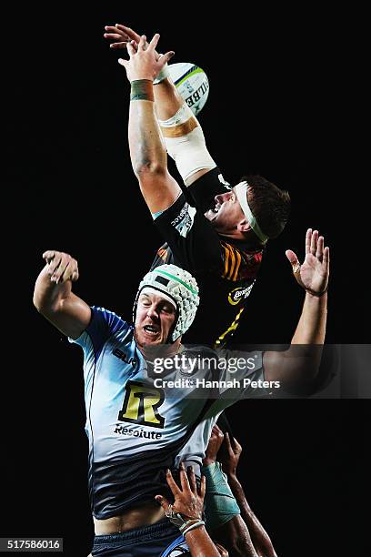 Tom Sanders of the Chiefs competes in the lineout with Ross Haylett-Petty of the Force during the round five Super Rugby match between the Chiefs and...