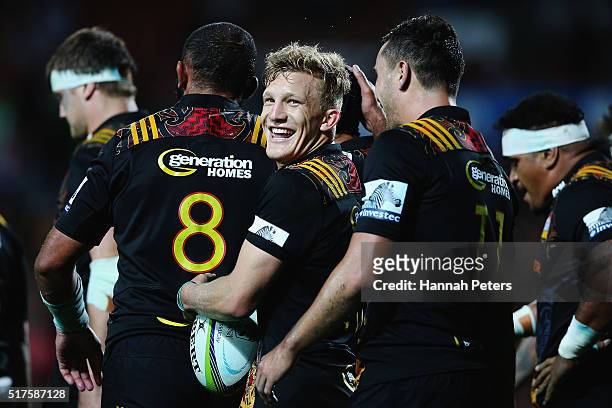 Damian McKenzie of the Chiefs celebrates after winning the round five Super Rugby match between the Chiefs and the Western Force at FMG Stadium on...