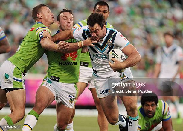 David Shillington of the Titans is tackled during the round four NRL match between the Canberra Raiders and the Gold Coast Titans at GIO Stadium on...