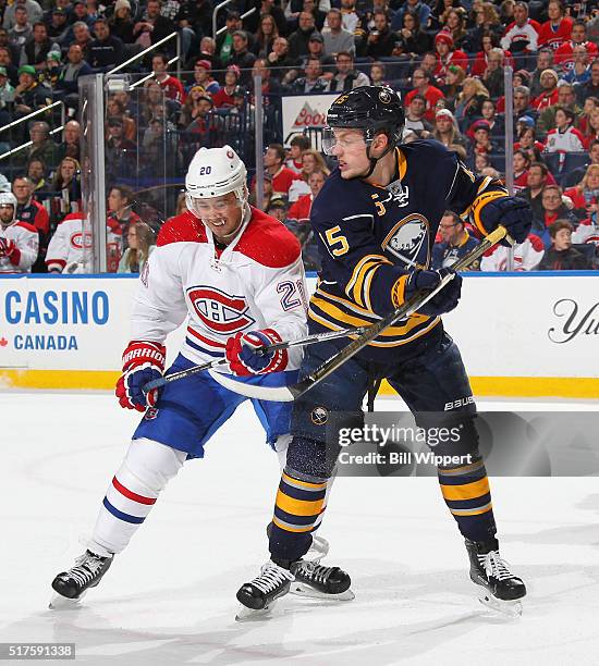 Jack Eichel of the Buffalo Sabres skates against Victor Bartley of the Montreal Canadiens during an NHL game on March 16, 2016 at the First Niagara...