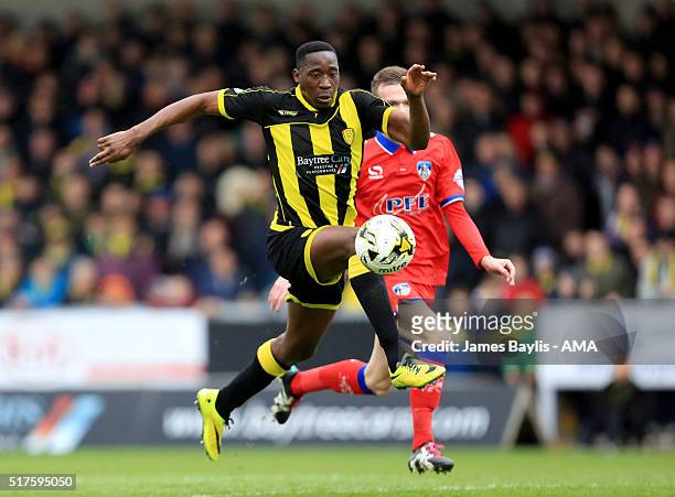 Lucas Akins of Burton Albion and Cameron Dummigan of Oldham Athletic during the Sky Bet League One match between Burton Albion and Oldham Athletic at...