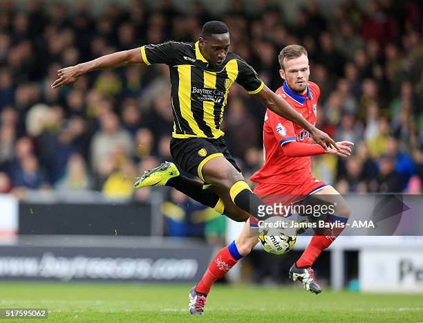 Lucas Akins of Burton Albion and Cameron Dummigan of Oldham Athletic during the Sky Bet League One match between Burton Albion and Oldham Athletic at...