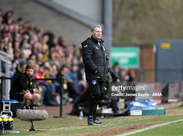 Manager John Sheridan of Oldham Athletic looks on during the Sky Bet League One match between Burton Albion and Oldham Athletic at Pirelli Stadium on...