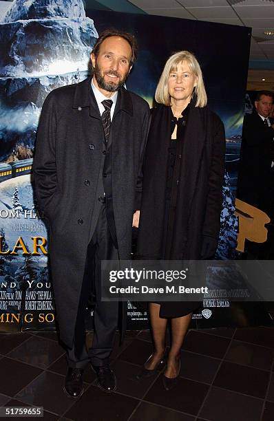 Producer Steve Starkey and guest arrive at the UK premiere of 'Polar Express' at Vue cinema in Leicester Square on November 17, 2004 in London.