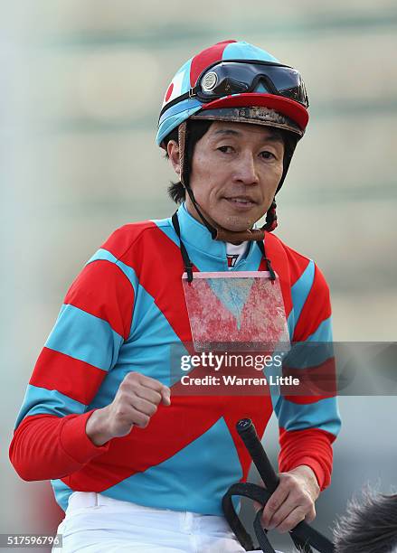 Yutaka Take celebrates after riding Lani to victory in the UAE Derby Sponsored By The Saeed & Mohammed Al Naboodah Group as part of the Dubai World...