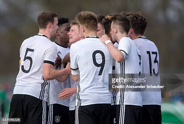 Philipp Ochs of Germany celebrates the first goal for his team with Benjamin Henrichs of Germany, Frederic Ananou of Germany, Maximilian Mittelstaedt...