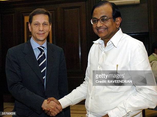 Russian Deputy Prime Minister Alexander D. Zhukov shake hands with Indian Finance Minister P. Chidambaram during a meeting at Ministry of Finance in...