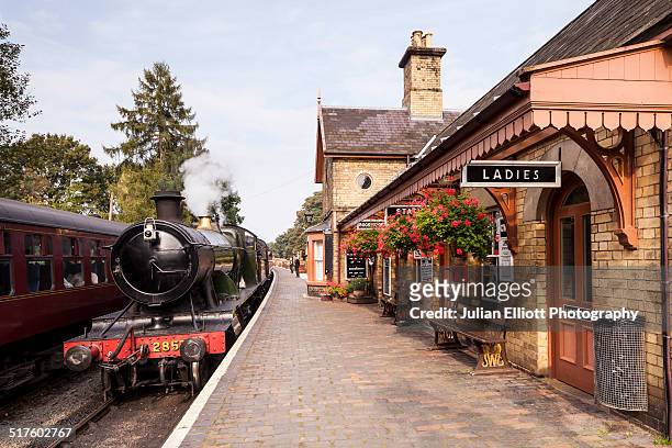 a steam train at arley station - locomotive bildbanksfoton och bilder