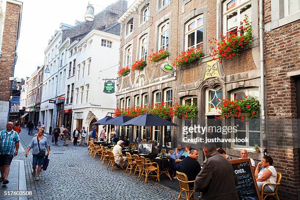 pedestrian zone kersenmarkt in maastricht - years of the kingdom of the netherlands in maastricht stockfoto's en -beelden