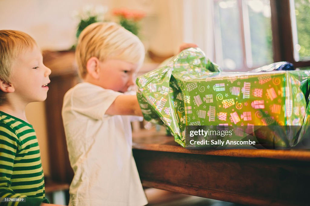 Child opening a birthday present