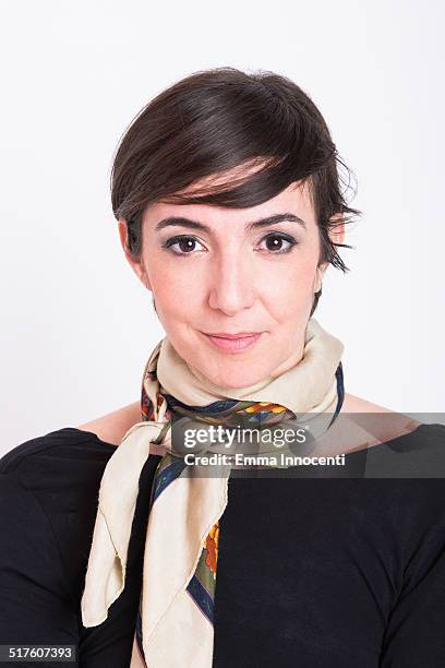 woman with silk scarf looking at camera - silk scarves stock pictures, royalty-free photos & images