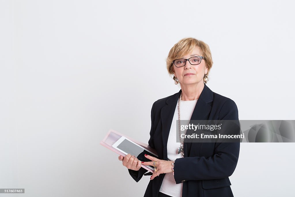 Mature business woman with black suit jacket