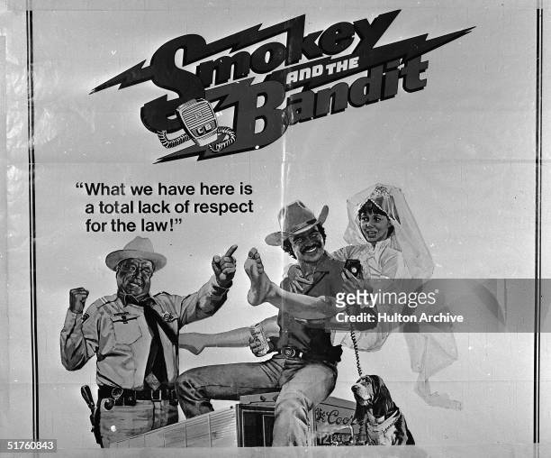 Movie poster for the film 'Smokey and the Bandit' features American actors Jackie Gleason , Burt Reynolds and Sally Field, 1977.