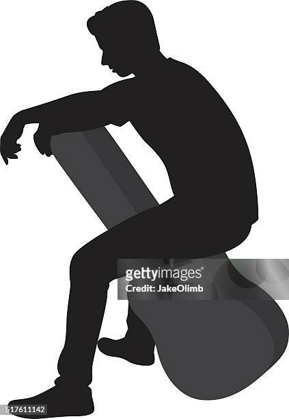 man sitting on guitar case silhouette - sillouette cool attitude stock illustrations