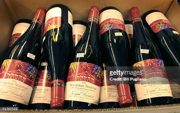 Bottles of French Beaujolais Nouveau are displayed at Holiday Market November 18, 2004 in Royal Oak, Michigan. More Than 85,000 bottles of the...