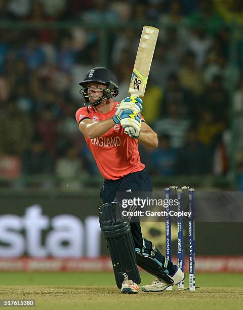 Jos Buttler of England hits out for six runs during the ICC World Twenty20 India 2016 Group 1 match between England and Sri Lanka at Feroz Shah Kotla...