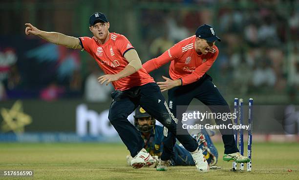 Ben Stokes of England celebrates with captain Eoin Morgan after running out Lahiru Thirimanne of Sri Lanka during the ICC World Twenty20 India 2016...