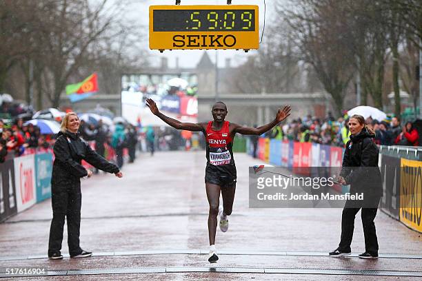 Geoffrey Kipsang Kamworor of Kenya crosses the line to win the Men's Half Marathon during the IAAF/Cardiff University World Half Marathon...
