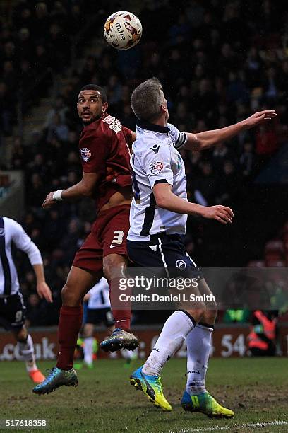 James Meredith of Bradford City AFC and Steve Morison of Millwall FC compete for the ball during the Sky Bet League One match between Bradford City...