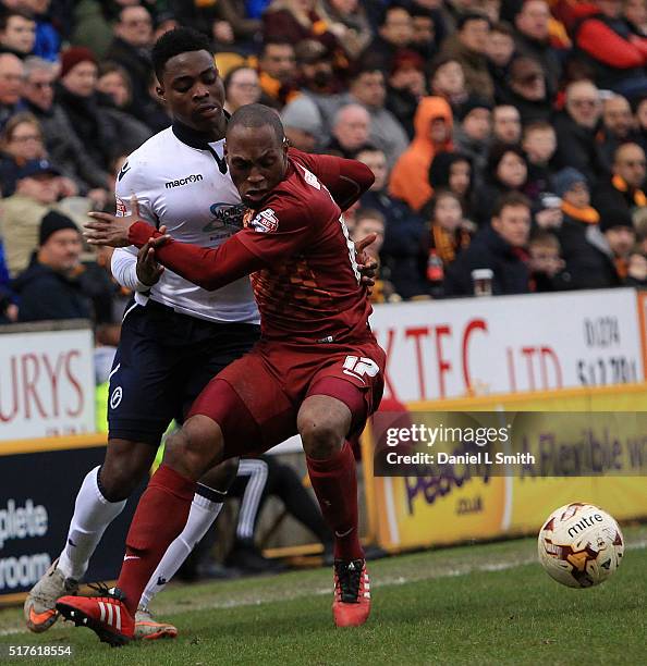 Fred Onyedinma of Millwall FC and Kyel Reid of Bradford City AFC compete for the ball during the Sky Bet League One match between Bradford City AFC...