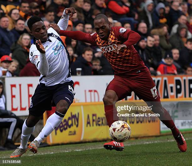 Fred Onyedinma of Millwall FC and Kyel Reid of Bradford City AFC compete for the ball during the Sky Bet League One match between Bradford City AFC...