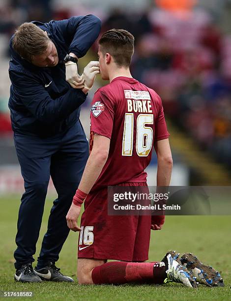 Reece Burke of Bradford City AFC receives medical attention during the Sky Bet League One match between Bradford City AFC and Millwall FC at Coral...