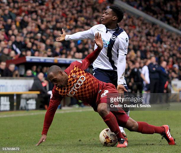 Fred Onyedinma of Millwall FC gestures looks at the referee after a tackle from Kyel Reid of Bradford City AFC during the Sky Bet League One match...