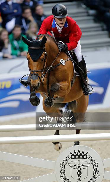 Peter Lutz of USA rides his horse Robin de Ponthual during the Longines FEI World Cup Jumping Final II event during the Gothenburg Horse Show at...