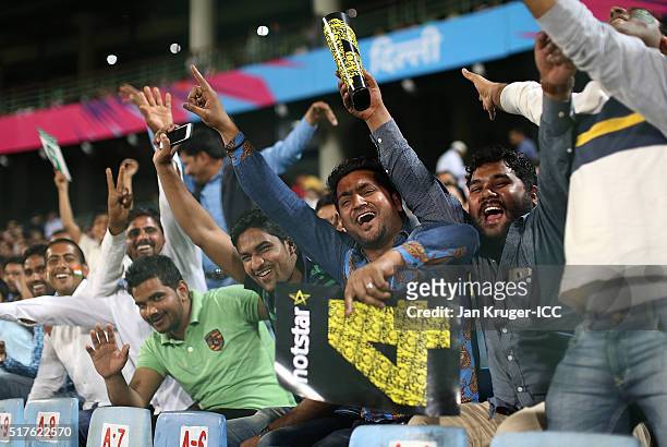 Fans cheer during the ICC World Twenty20 India 2016 Super 10s Group 1 match between England and Sri Lanka at The Feroz Shah Kotla Cricket Ground on...