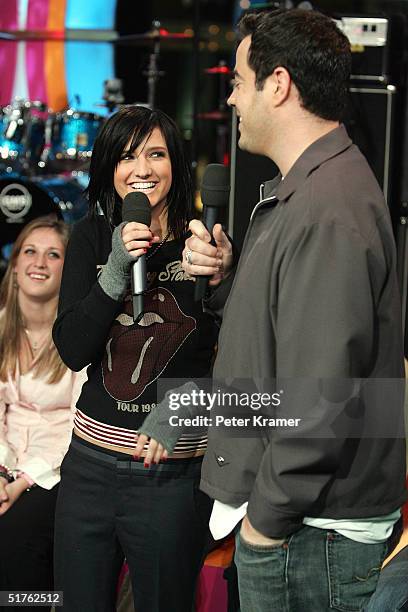 Singer Ashlee Simpson appears on MTV's Total Request Live with MTV VJ Carson Daly at MTV Times Square Studios November 18, 2004 in New York City