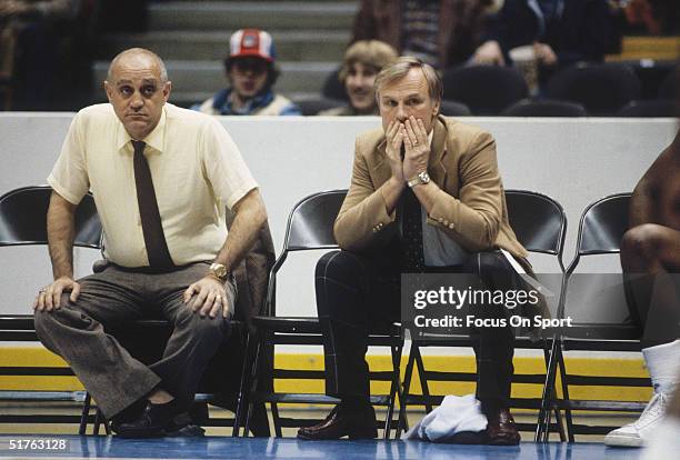 Jerry Tarkanian head coach of UNLV Rebels watches his team on the sidelines in a game against Western Kentucky Hilltoppers during the 1980s.