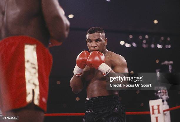 Mike Tyson boxes Frank Bruno at the Hilton Hotel-Casino on February 25, 1989 in Las Vegas, Nevada. Tyson defeated Bruno with a TKO in Round 5.