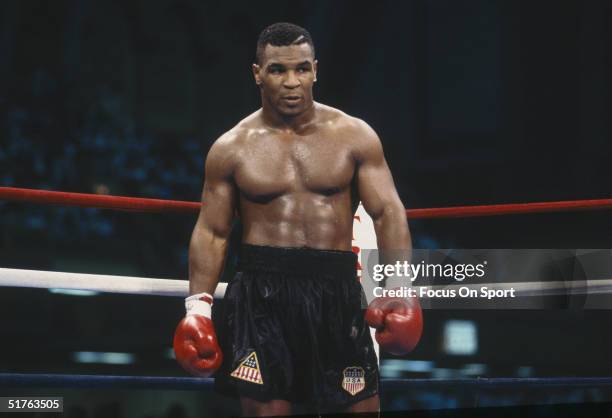 Mike Tyson stands in the ring during the fight with Carl Williams at the Convention Center on July 21, 1989 in Atlantic City, New Jersey. Tyson...