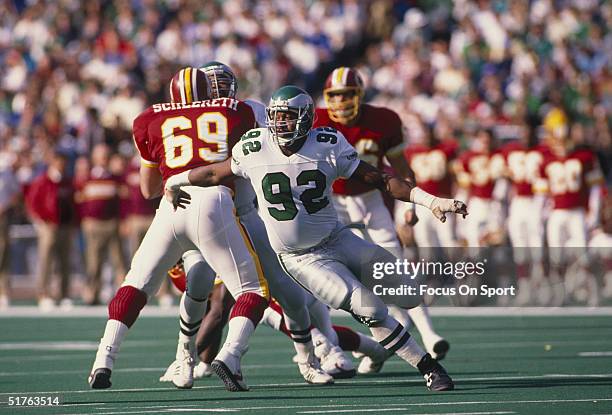 Reggie White of the Philadelphia Eagles runs in play against the Washington Redskins during the 1992 season.