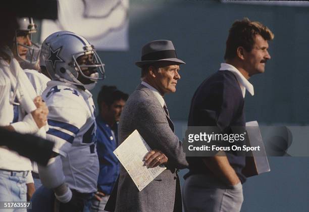 Dallas Cowboys' coach Tom Landry watches the action on the field. Tom Landry directed the Dallas Cowboys to 20 consecutive winning seasons from...