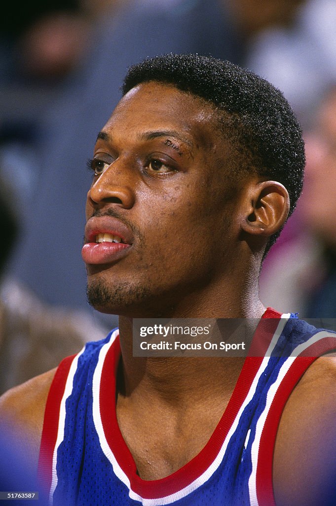 Detroit Rodman Dennis Rodman of the Detroit Pistons sits on the sidelines and... News ...