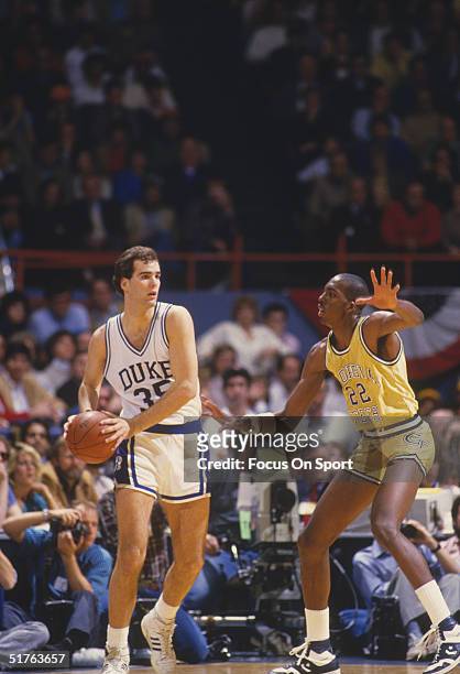Danny Ferry of Duke University looks to pass the ball during a game in the 1980s.