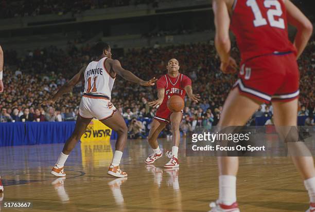 Mark Jackson of St. John's passes the ball to a teammate during a game against Syracuse in the 1980s.