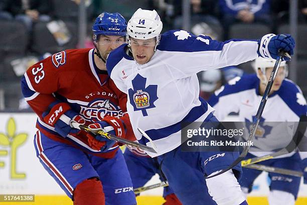 St. John's IceCaps left wing John Scott slows up Toronto Marlies right wing Josh Leivo in the mid ice area. Toronto Marlies V St. John's Ice Caps...