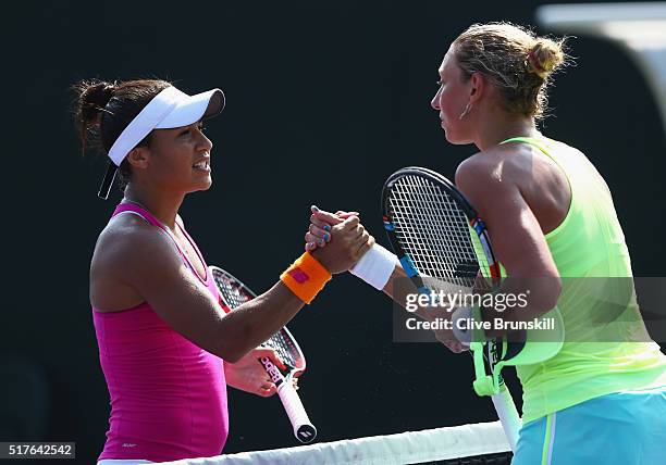 Heather Watson of Great Britain shakes hands at the net after her three set victory against Yanina Wickmayer of Belgium in their third round match...