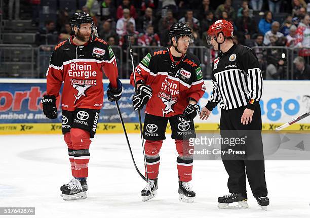 Frederik Eriksson and Patrick Hager of the Koelner Haien during the DEL playoff match between Koelner Haie and the Eisbaeren Berlin on March 26, 2016...