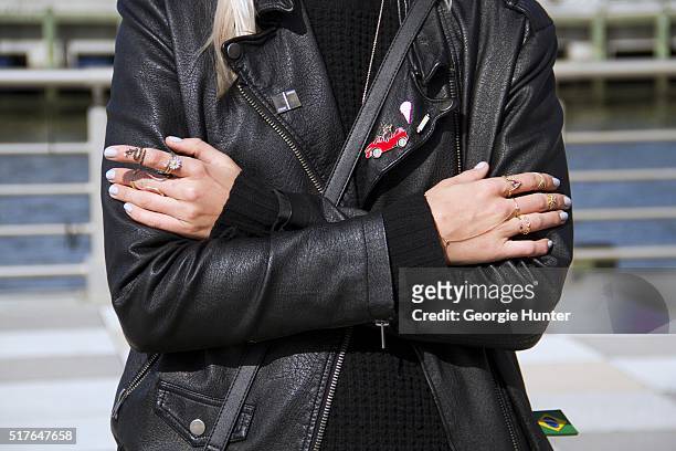 Emily Mercer wearing Urban Outfitters black leather jacket, pins on jacket by ByChloe with Pintrill, PamLovesFerrariBoyz, FriendsNYC and Fightball,...