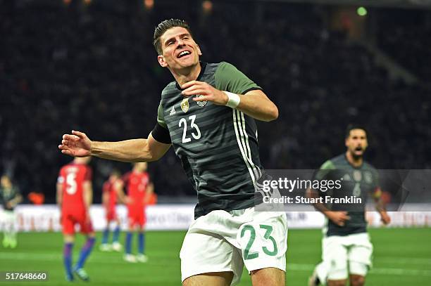 Mario Gomez of Germany celebrates scoring his team's second goal during the International Friendly match between Germany and England at...