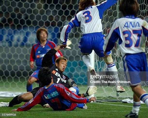 Yoichi Doi of FC Tokyo makes a save a shot by Naoki Matsuda of Yokohama F.Marinos during the J.League match between FC Tokyo and Yokohama F.Marinos...