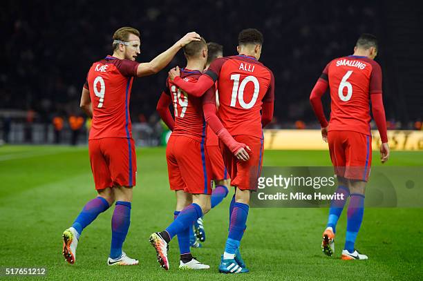 Jamie Vardy of England celebrates scoring his team's second goal with his team mates Harry Kane , Dele Alli of England during the International...