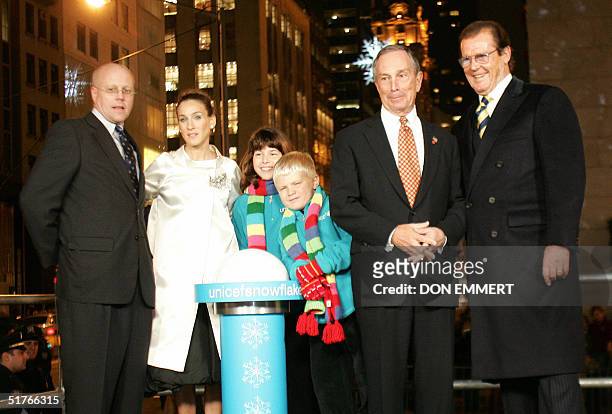 Participants in the ceremony for the lighting of the UNICEF Crystal Snowflake in New York City 18 November, 2004 are President for US Fund for UNICEF...