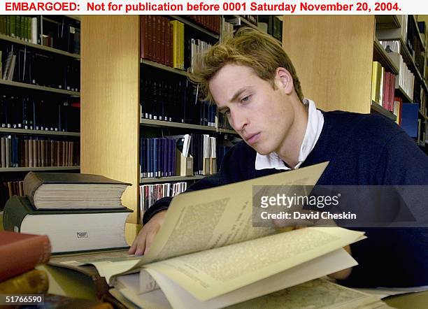 Prince William studies in the main university library on November 15 at St Andrews University, Scotland. The Prince is in the last year of his...